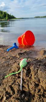 Close-up of toy on shore