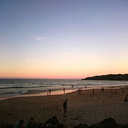 Scenic view of sea at sunset