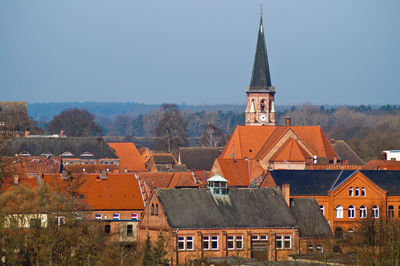 Close-up of buildings with church in background