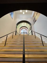 Low angle view of illuminated staircase in building