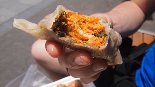 Close-up of man eating food