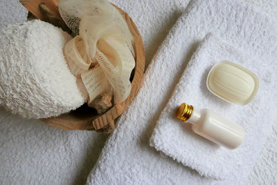 High angle view of bathing products on towel