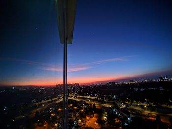 High angle view of illuminated city at night