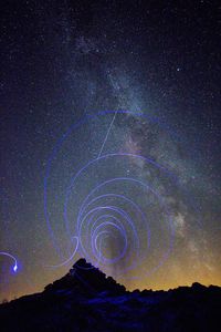 Low angle view of stars in sky