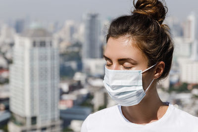 Portrait of woman wearing mask