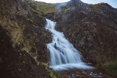 Scenic view of waterfall in forest