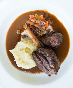 Close-up of served food in plate