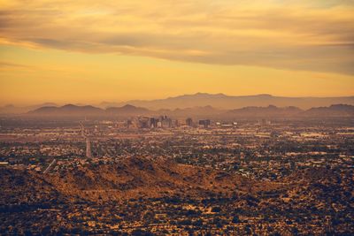 Scenic view of landscape against sky during sunset