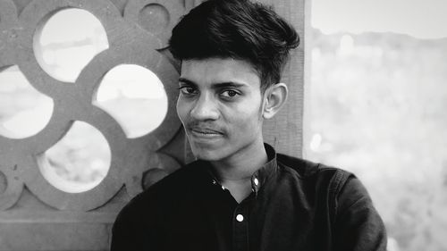 Portrait of smiling mid adult man