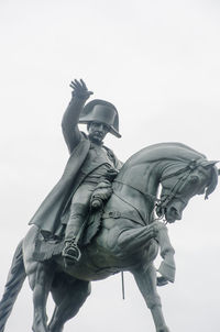 Low angle view of statue against clear sky