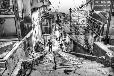 Alley amidst buildings in city