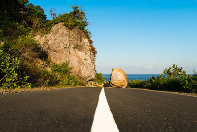 Surface level of road against sky