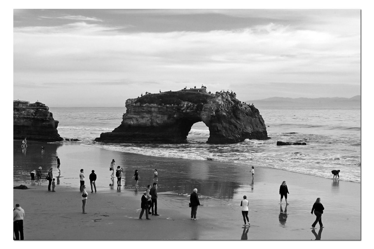 GROUP OF PEOPLE ON BEACH