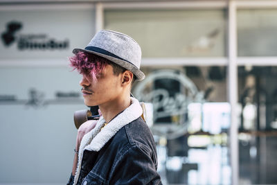 Side view of man with skateboard