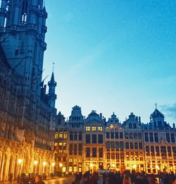 Buildings in city at dusk