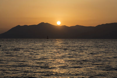 Scenic view of sea against sky during sunset