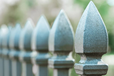 Close-up of metal fence against blurred background