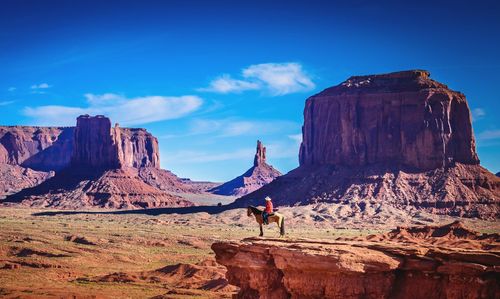 Man standing on cliff