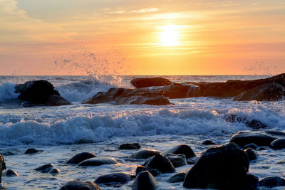 Scenic view of sea against sky during sunset