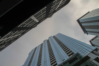 Low angle view of modern buildings against sky