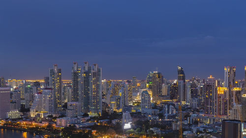 Panorama of landscape with sunset over the building and blue sky at bangkok ,thailand.