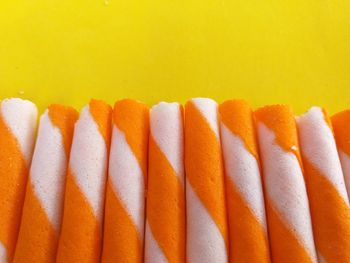 Close-up of colored pencils against white background