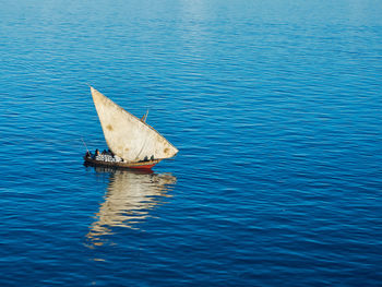 Sailboat sailing in sea