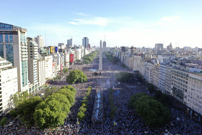 Buildings in city against sky