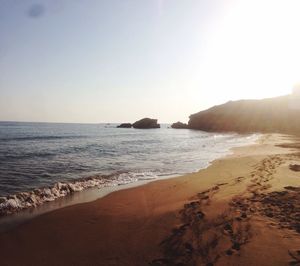 Scenic view of beach against sky