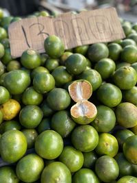 Fresh green oranges in truck market