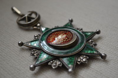 High angle view of old tea cup on table