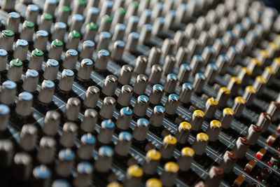 Full frame shot of sound mixer at studio