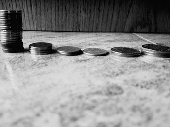 Close-up of coins on table