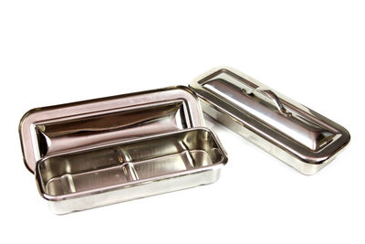 High angle view of objects over white background