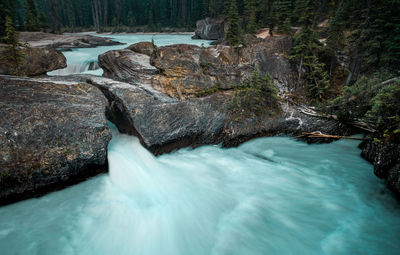 Stream flowing through rocks