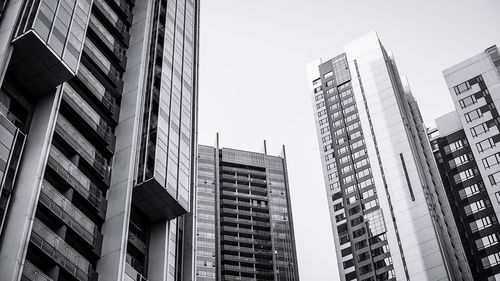 Low angle view of skyscrapers against clear sky