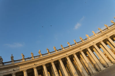 Low angle view of built structure against blue sky