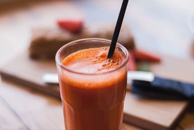 Close-up of juice in glass on table