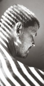 Close-up portrait of man in light