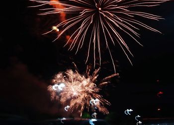 Low angle view of firework display