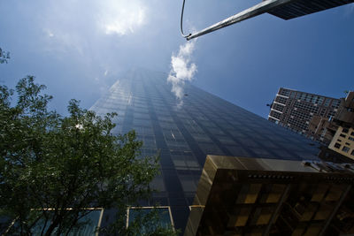 Low angle view of modern building against sky