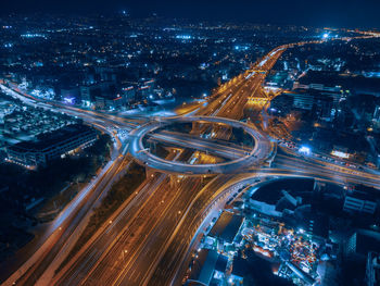 High angle view of illuminated cityscape at night