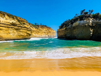 Scenic view of sea against blue sky