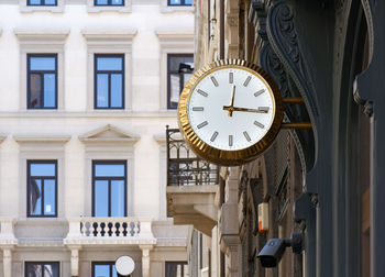 Low angle view of clock on building