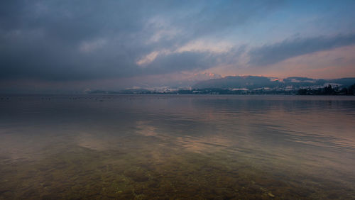 Scenic view of sea against sky during sunset