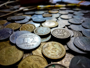 High angle view of coins