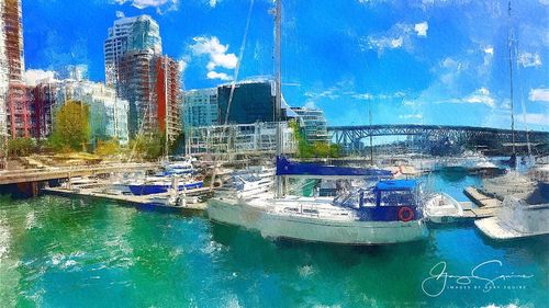 Close-up of modern buildings against blue sky