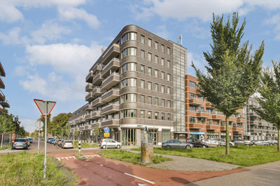 Buildings in city against sky