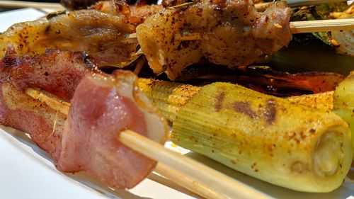 High angle view of meat on barbecue grill