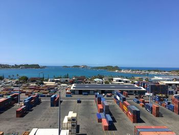 High angle view of sea against clear blue sky